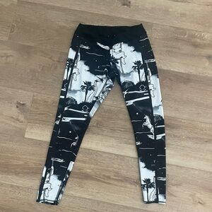 Reebok CrossFit Black/White Leggings: Surfing Unicorns/Sharks
Size: Medium